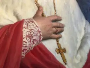Détail de la main d'un évêque sur un tableau